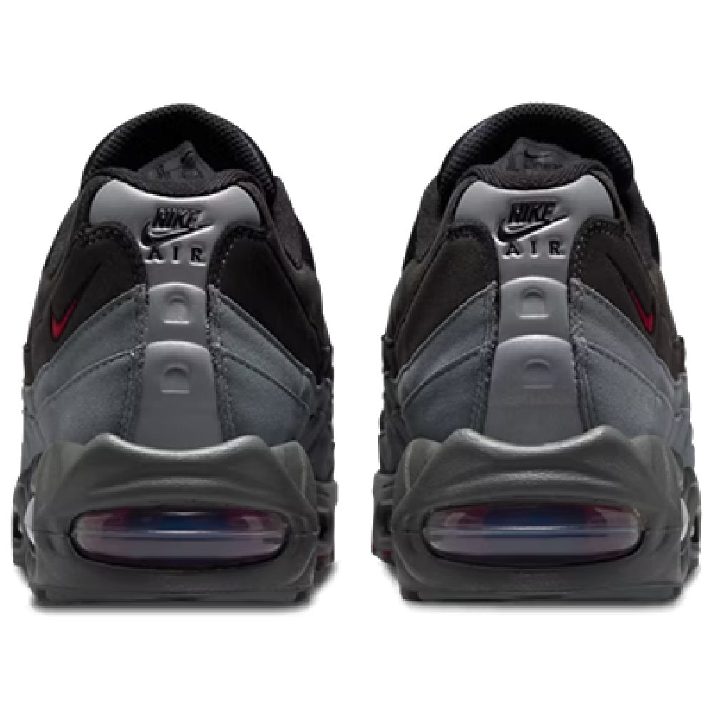 Black sneakers with gray heel panels and 'Nike Air' branding on the back