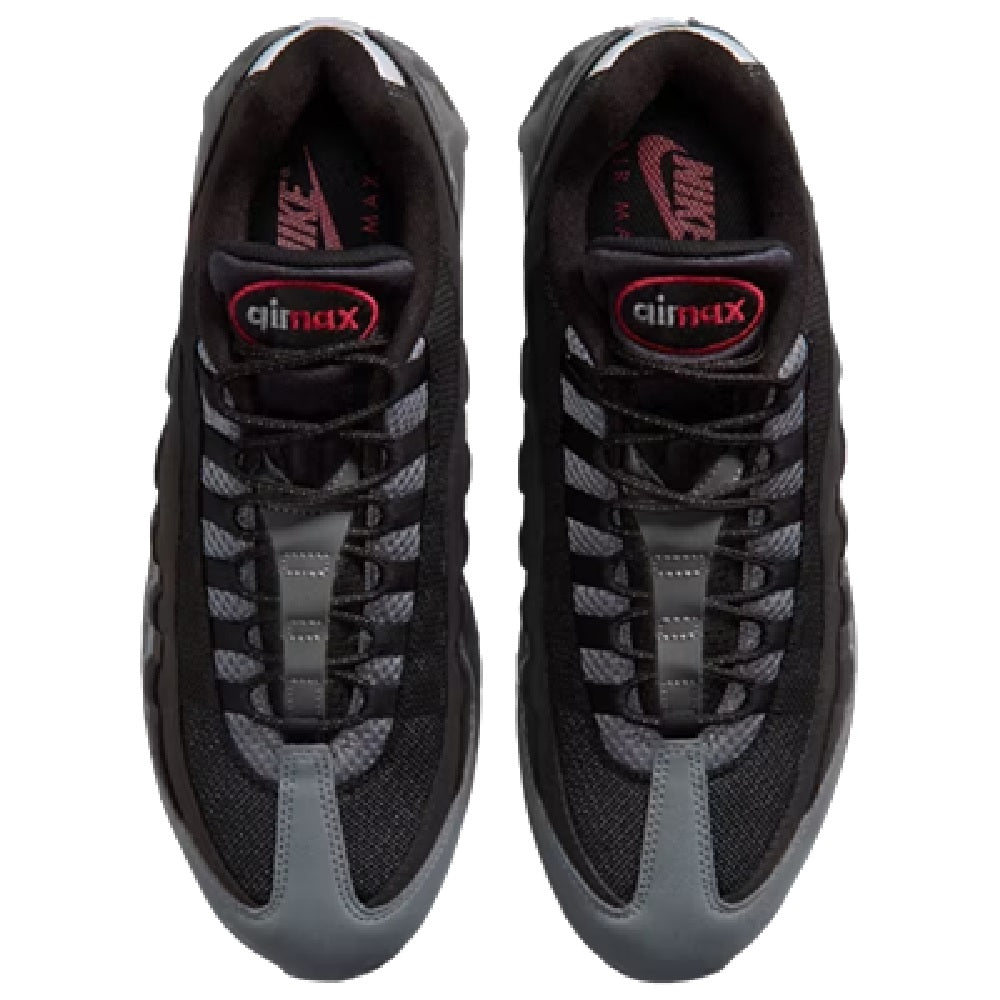 Black sneakers with gray laces and 'Air Max' logo on the tongue