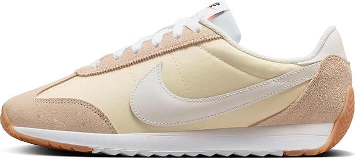 Women's Nike low-top sneakers in beige, cream, and white with lace-up.