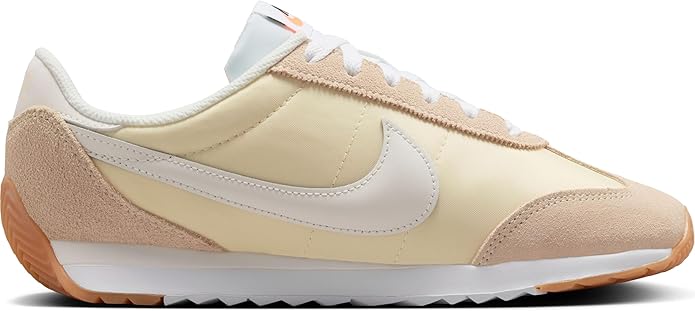Women's Nike low-top sneakers with white Swoosh and beige suede side panels.
