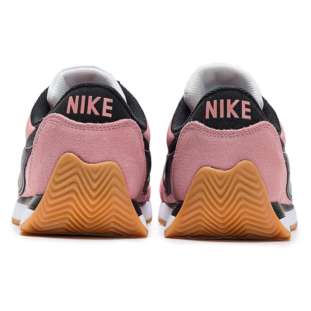 Women's Nike sneakers heel and toe view, blush pink with gum rubber sole
