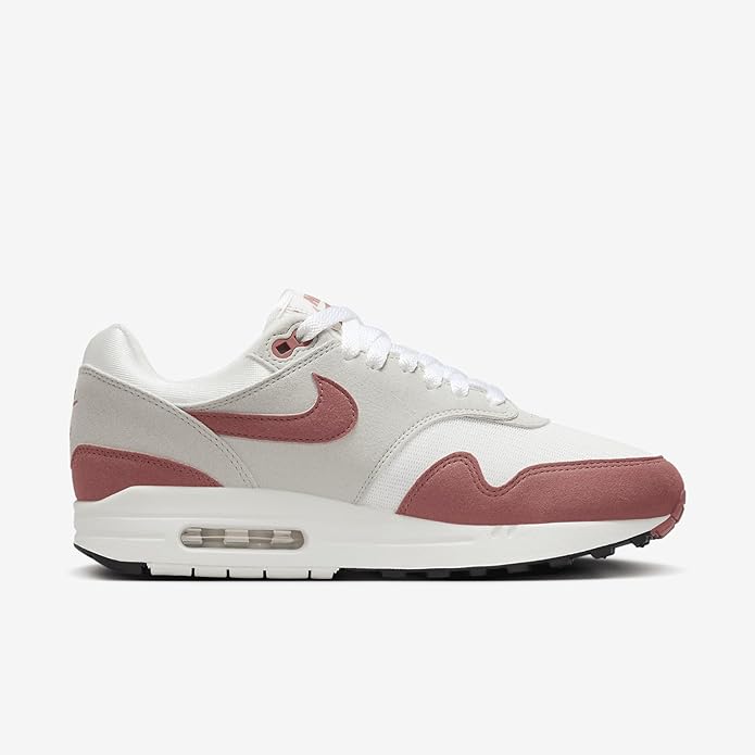 Women's Nike Air Max 1 '87 sneaker, white upper with blush pink Swoosh and Air window
