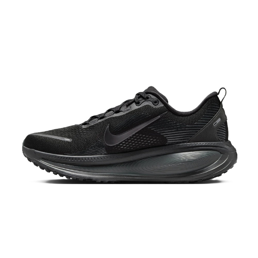 Black Nike running shoes, side view with Nike swoosh and textured knit upper