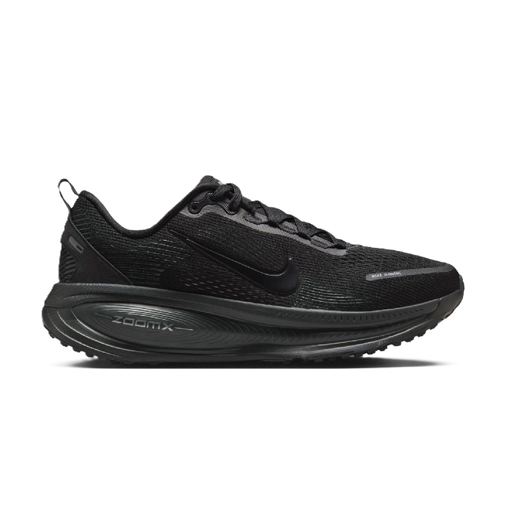 Women's Nike Vomero 18 black running shoes, side view with ZoomX midsole detail