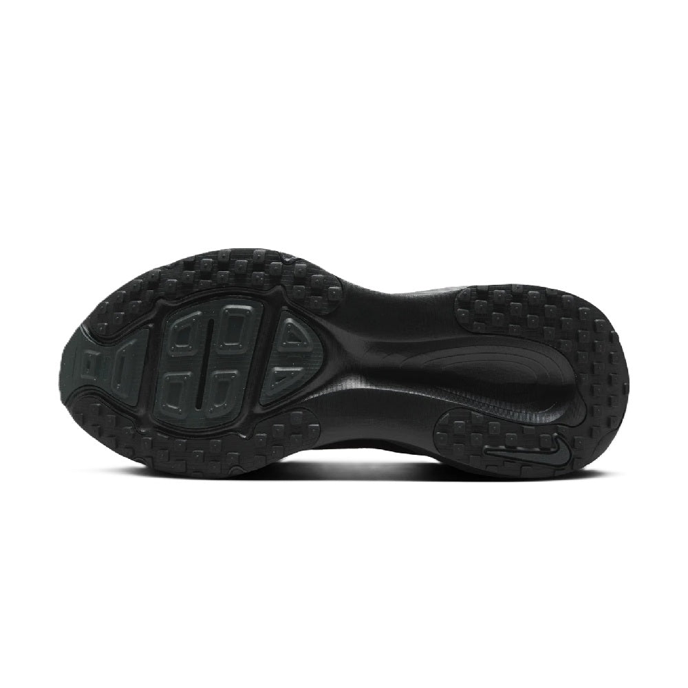 Women's Nike Vomero 18 black outsole tread, showing traction pattern underside