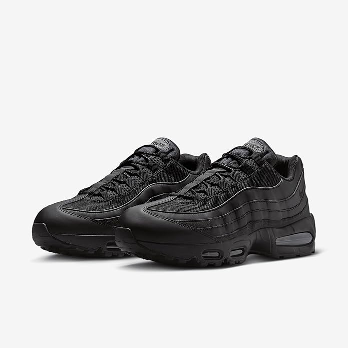 Pair of Nike Air Max 95 sneakers, black knit upper with visible air cushioning