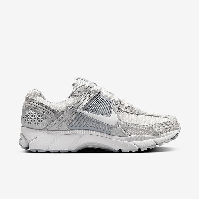 Nike Zoom Vomero 5 running shoe, front three-quarter view, light gray and white mesh
