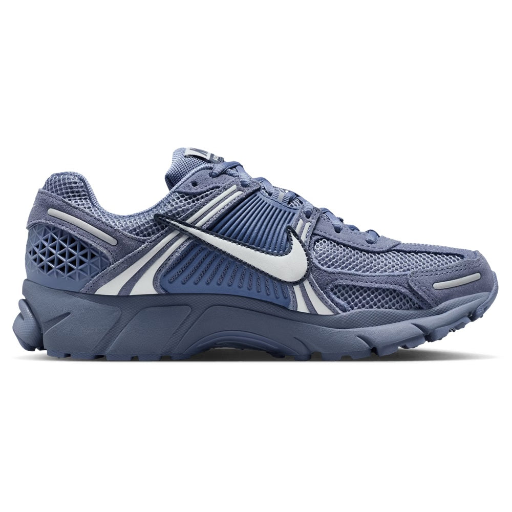 Nike Zoom Vomero 5 running shoes in blue and gray, mesh upper with white swoosh detail