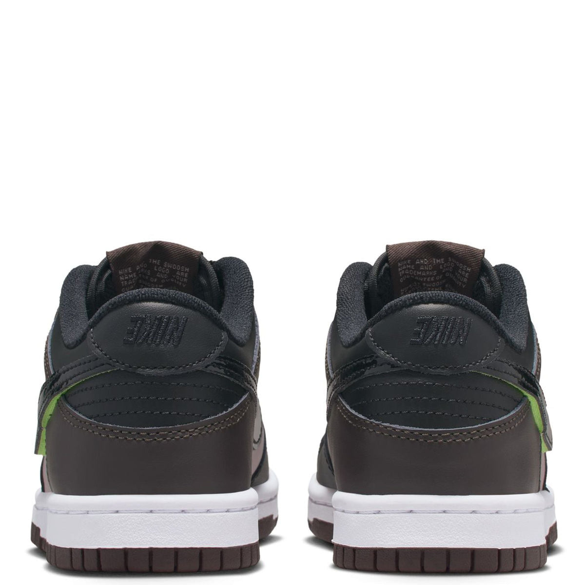 Big kid's Nike Dunk Low SE heel view sneakers in dark gray black with green accent stripe