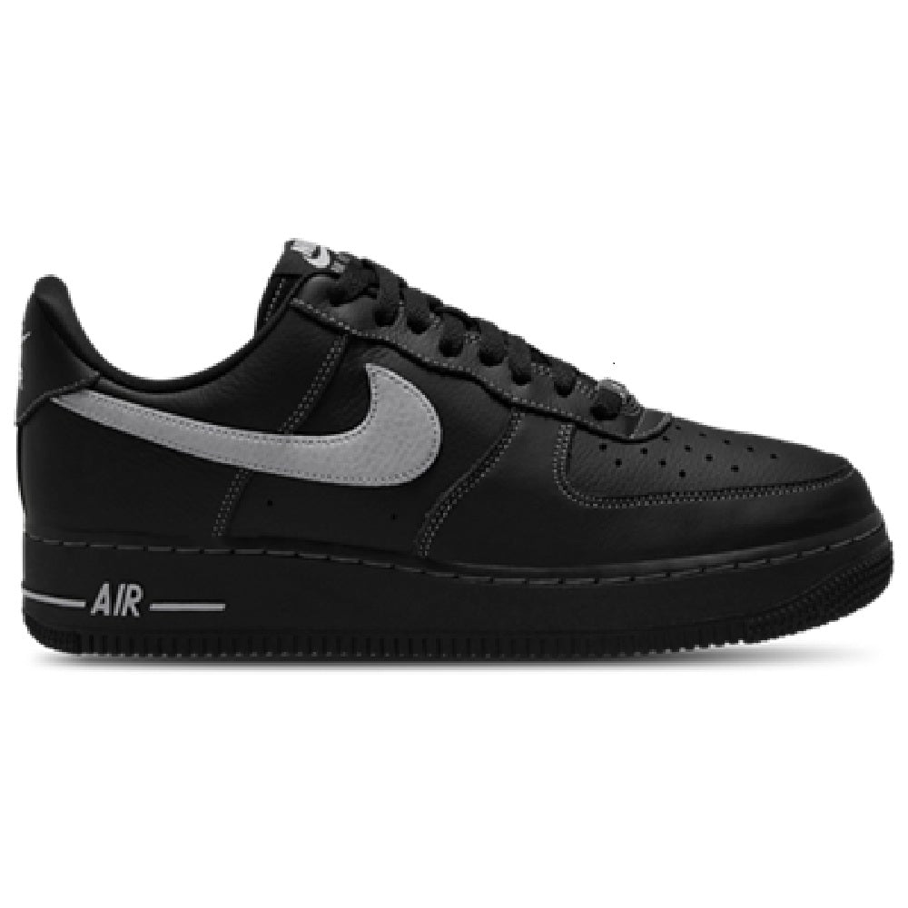 Black low-top Nike Air Force 1 sneaker with gray swoosh and lace-up closure