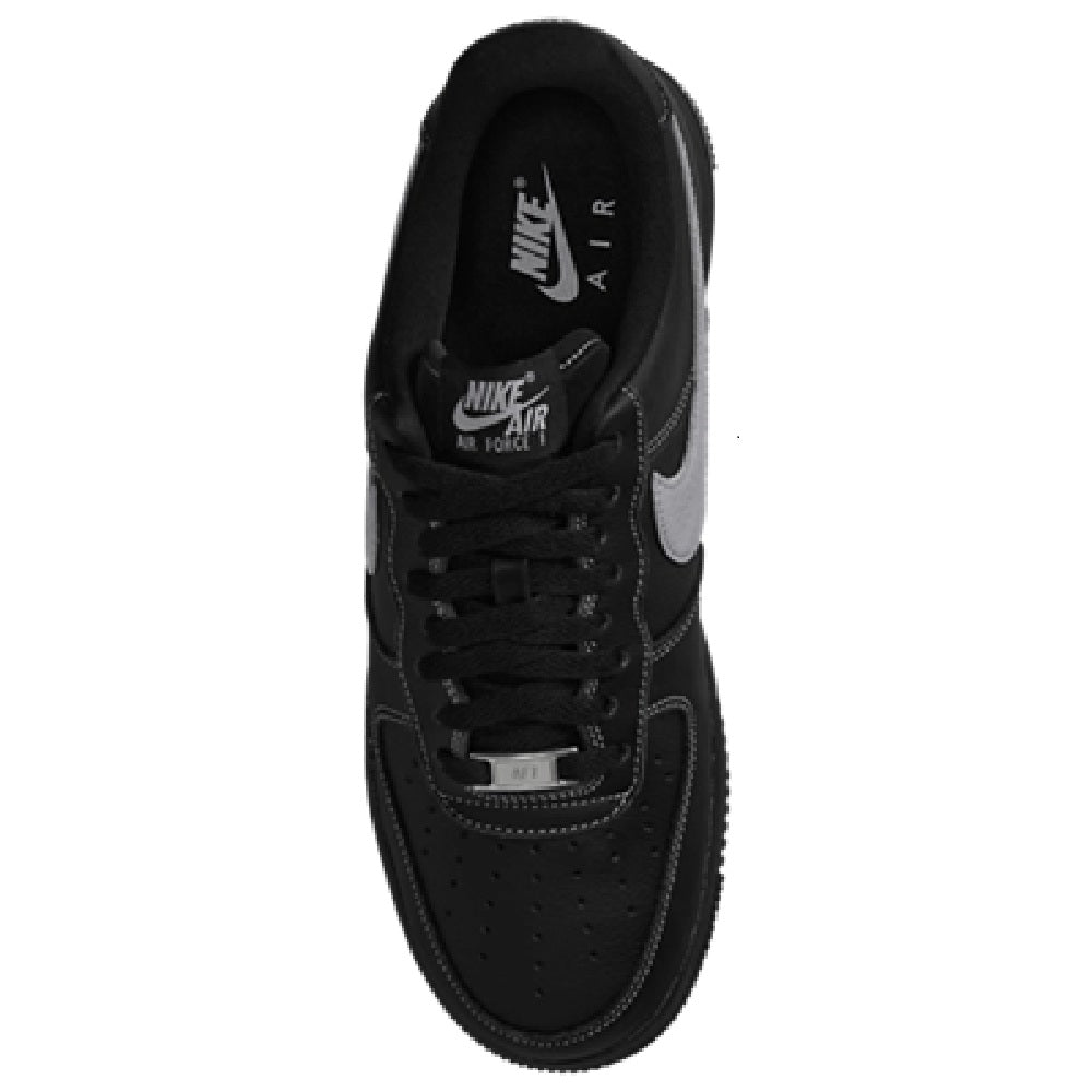 Black Nike low-top sneaker with lace-up front and Nike Air branding on tongue