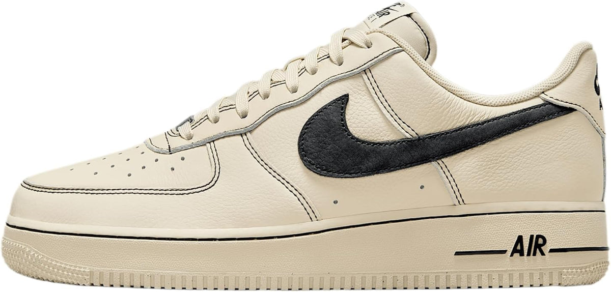 Khaki and black leather low-top sneakers with Nike swoosh and 'AIR' detail.