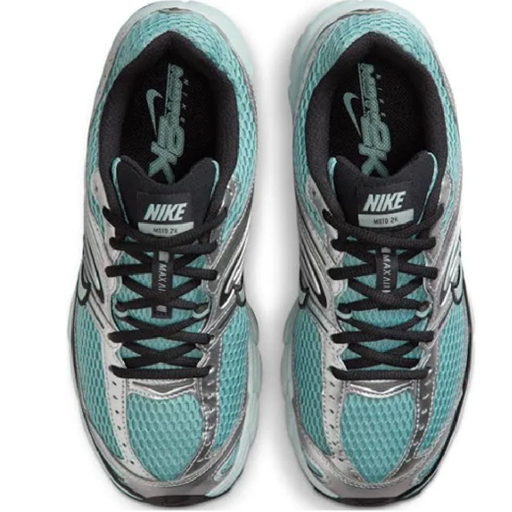 Pair of Nike sneakers with teal mesh uppers, black laces, and Nike logo on tongue.