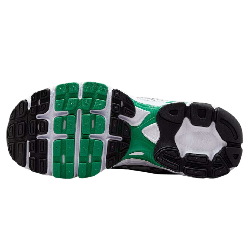Nike Air Max Moto 2K outsole, black-and-white traction with green center stripe.