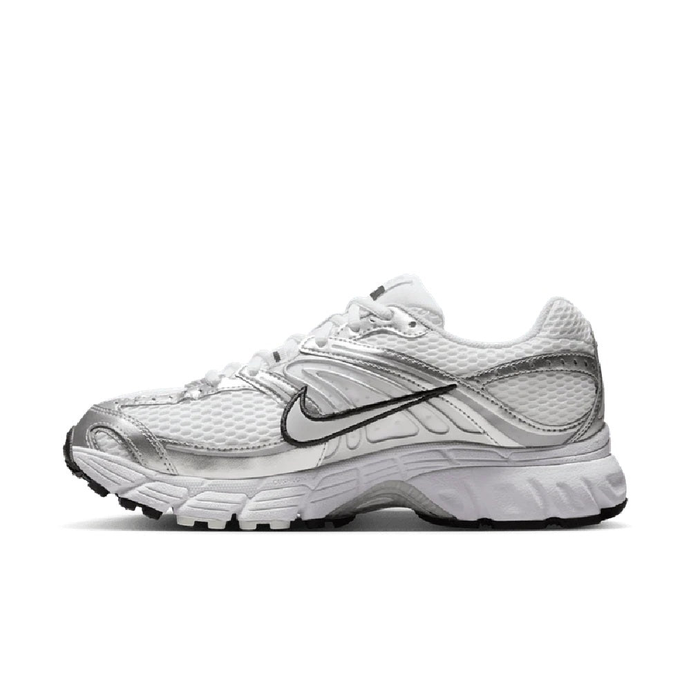 Women’s Nike Air Max Moto 2K lace-up sneakers, white upper with metallic gray overlays.