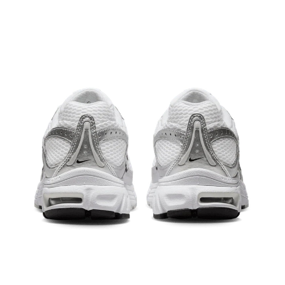 Women’s Nike Air Max Moto 2K sneakers, rear view with cushioned heel and gray trim.