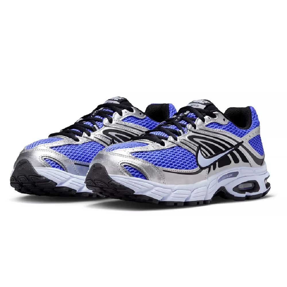 Nike Air Max Moto 2K sneakers, angled view with sapphire blue upper, silver panels, black laces