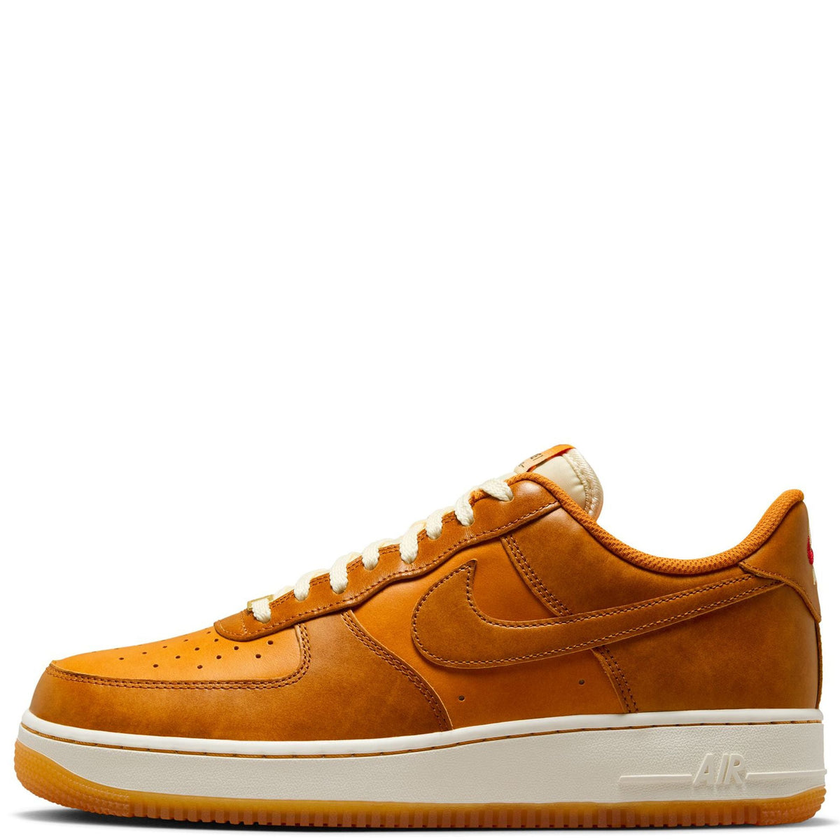 Nike Air Force 1 '07 suede sneakers in tan-orange with white midsole and lace-up design