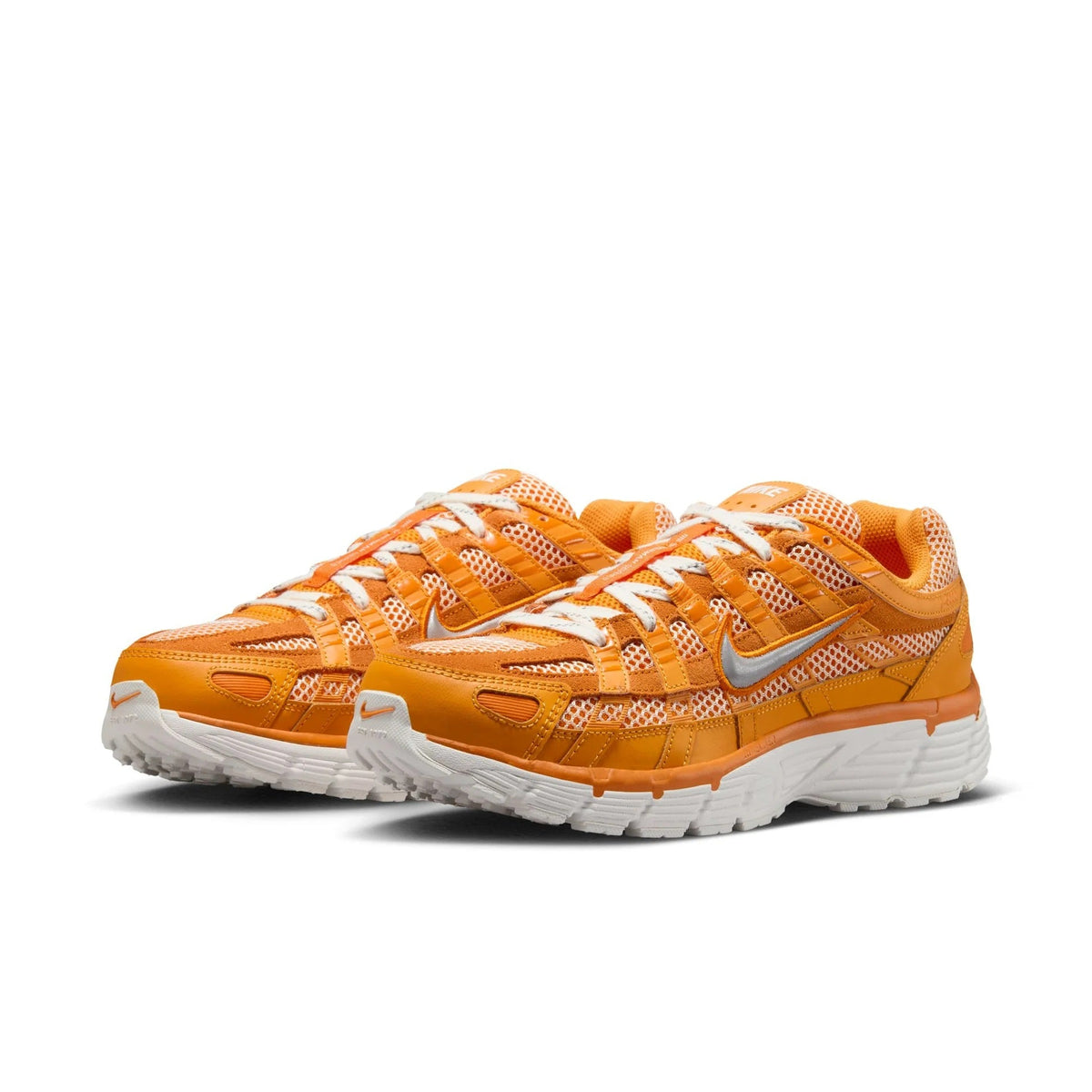Men's Nike P-6000 PRM sneakers in orange, white laces, textured mesh, side view