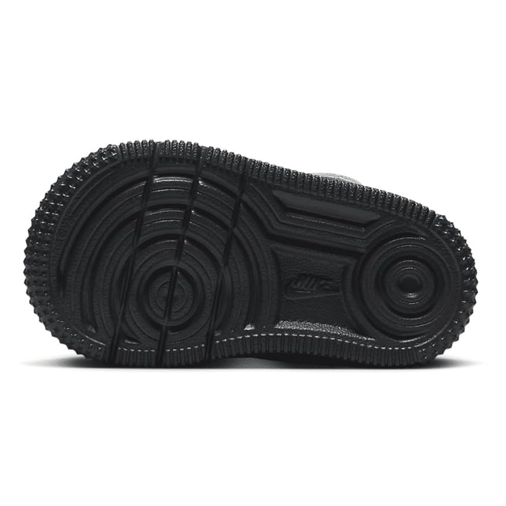 Toddler Nike Force 1 Low sneaker outsole, black tread with circular traction patterns