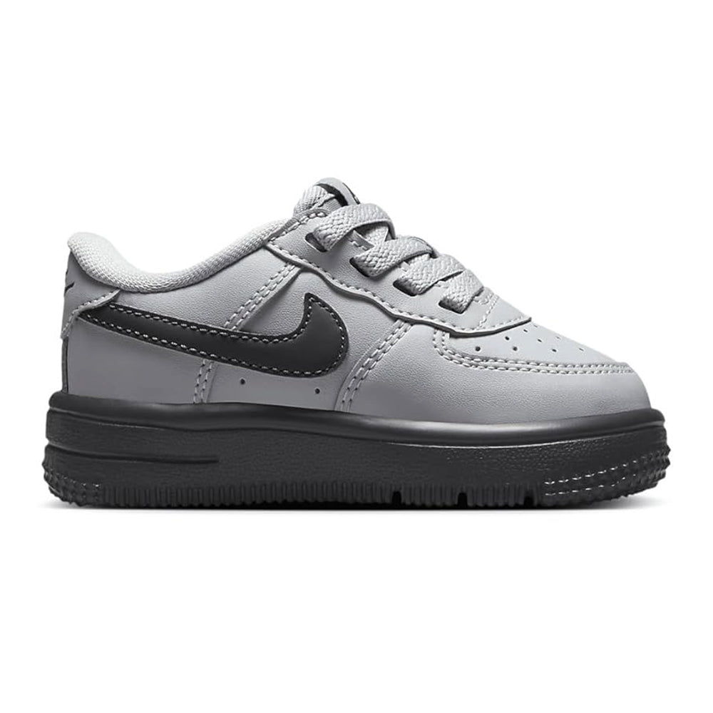 Toddler Nike Force 1 Low sneakers side view, light grey leather with dark grey swoosh