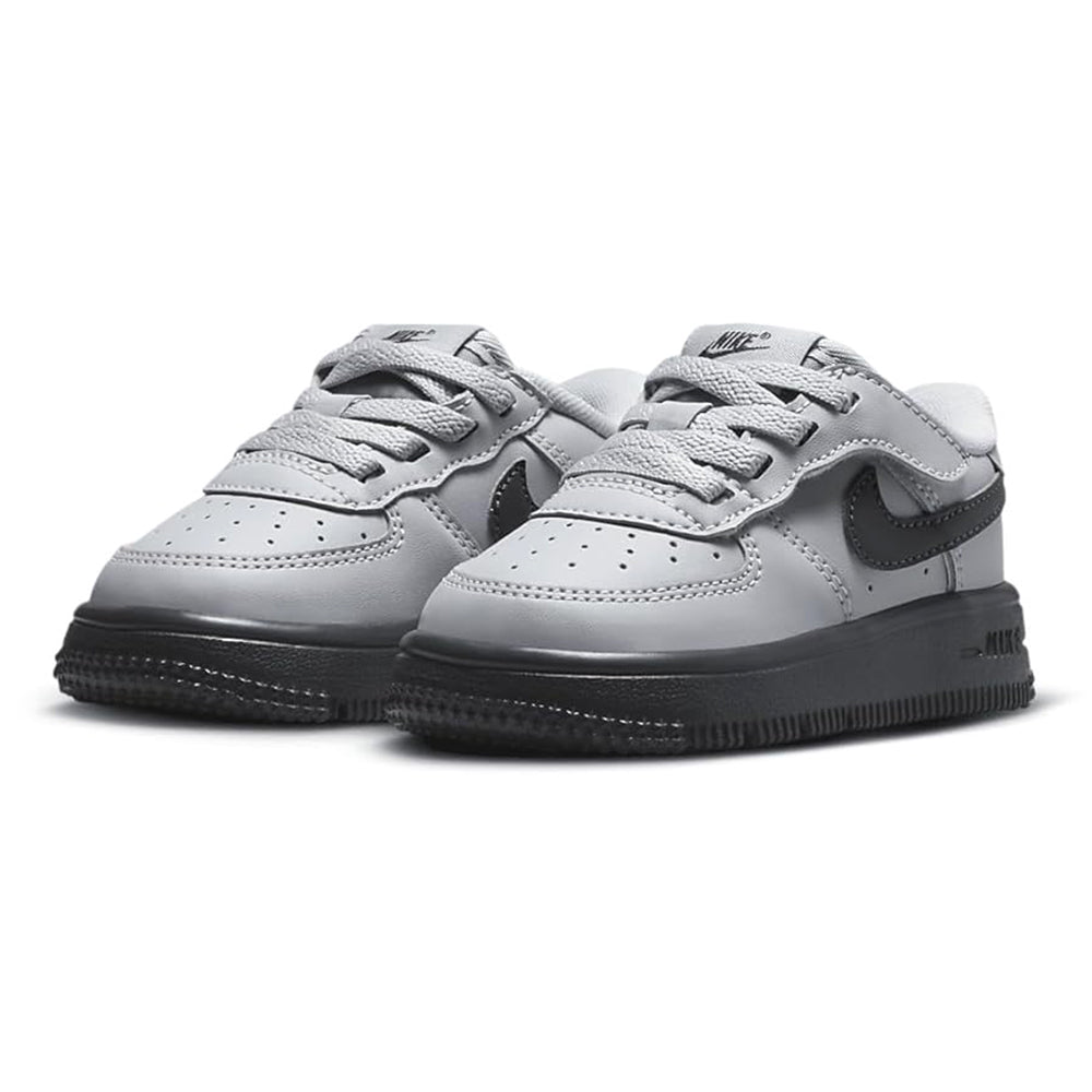 Toddler Nike Force 1 Low sneakers, front/side angle, light grey uppers and dark grey swoosh