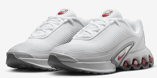 Kids' Nike Air Max DN SE sneakers, light gray front view with red air pods and laces
