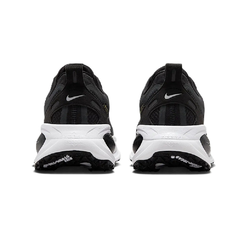 Men's Nike Vomero 18 GTX shoes, rear view with black heel tab and white midsole cushioning