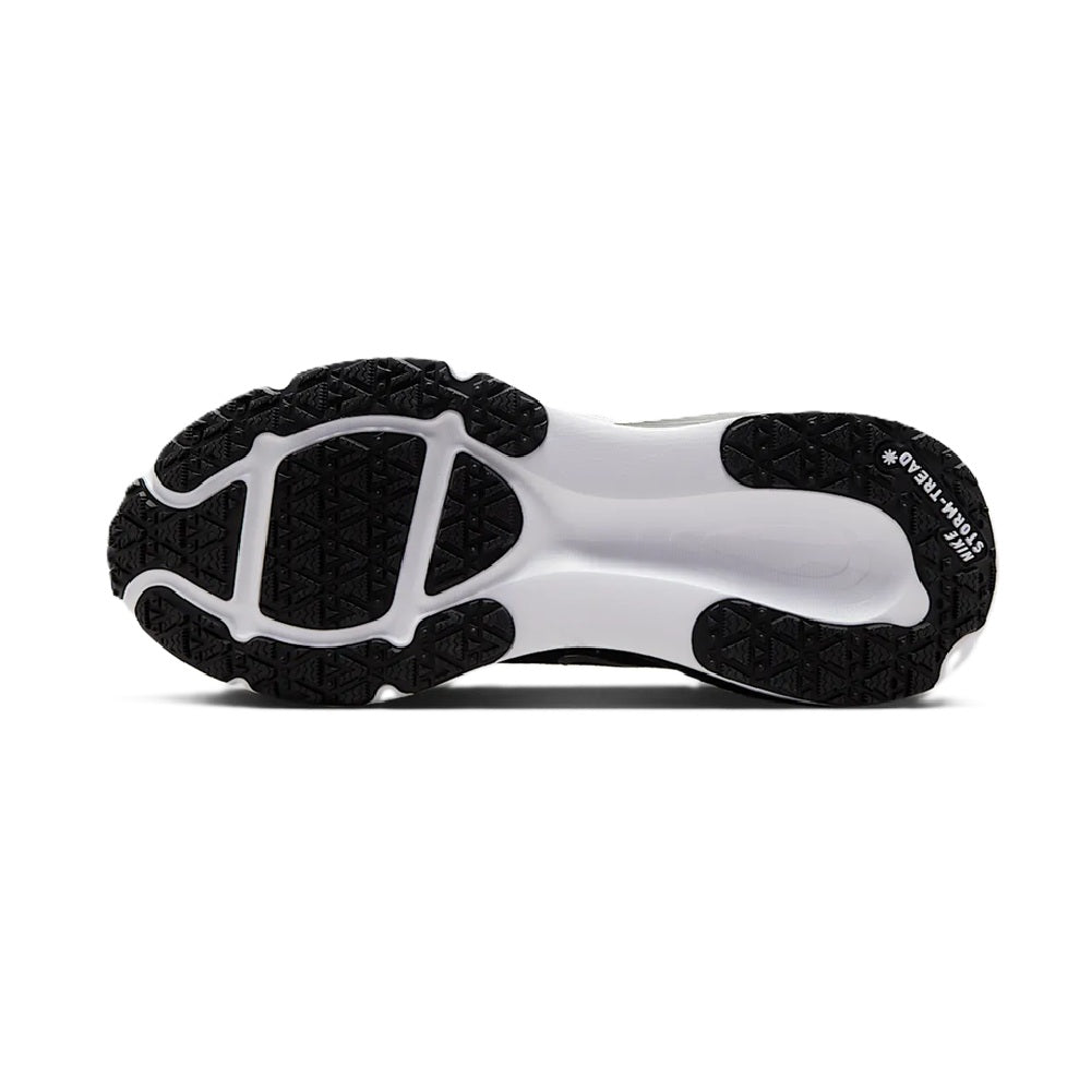 Men's Nike Vomero 18 GTX shoe outsole, black traction pattern with white foam section