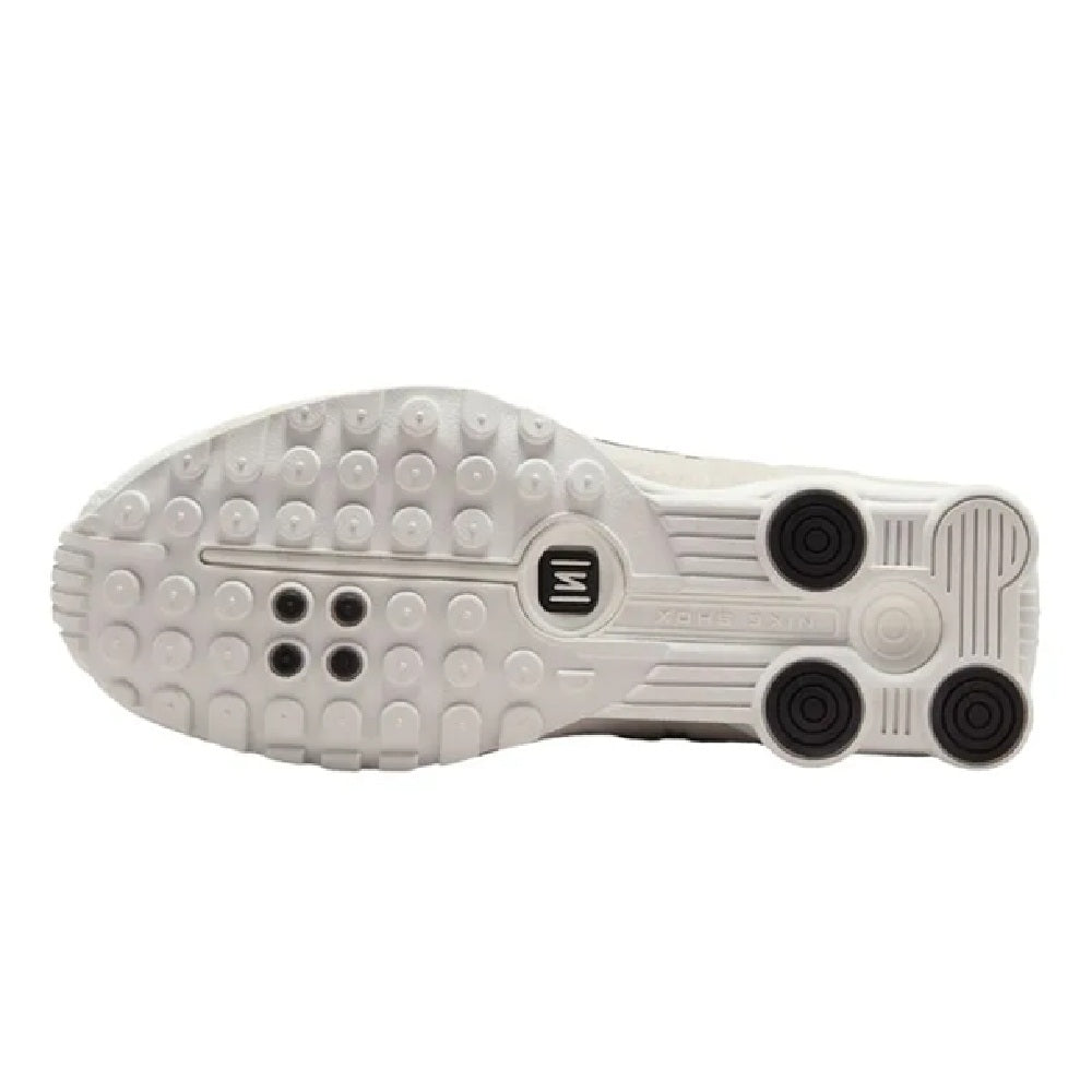Nike Shox R4 outsole tread with grippy rubber pods on light gray base