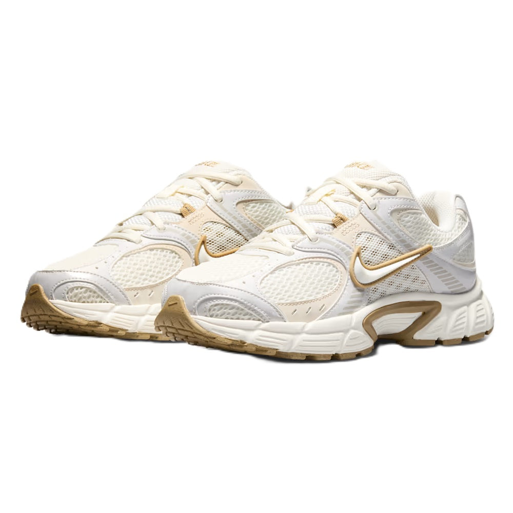 Women's Nike V5 RNR running shoe, front view with mesh panels and gold Nike logo