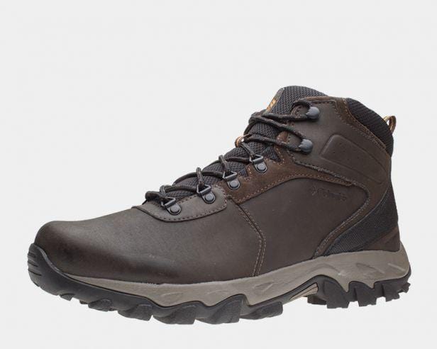 Brown ankle hiking boots with lace-up closure and rugged rubber outsole