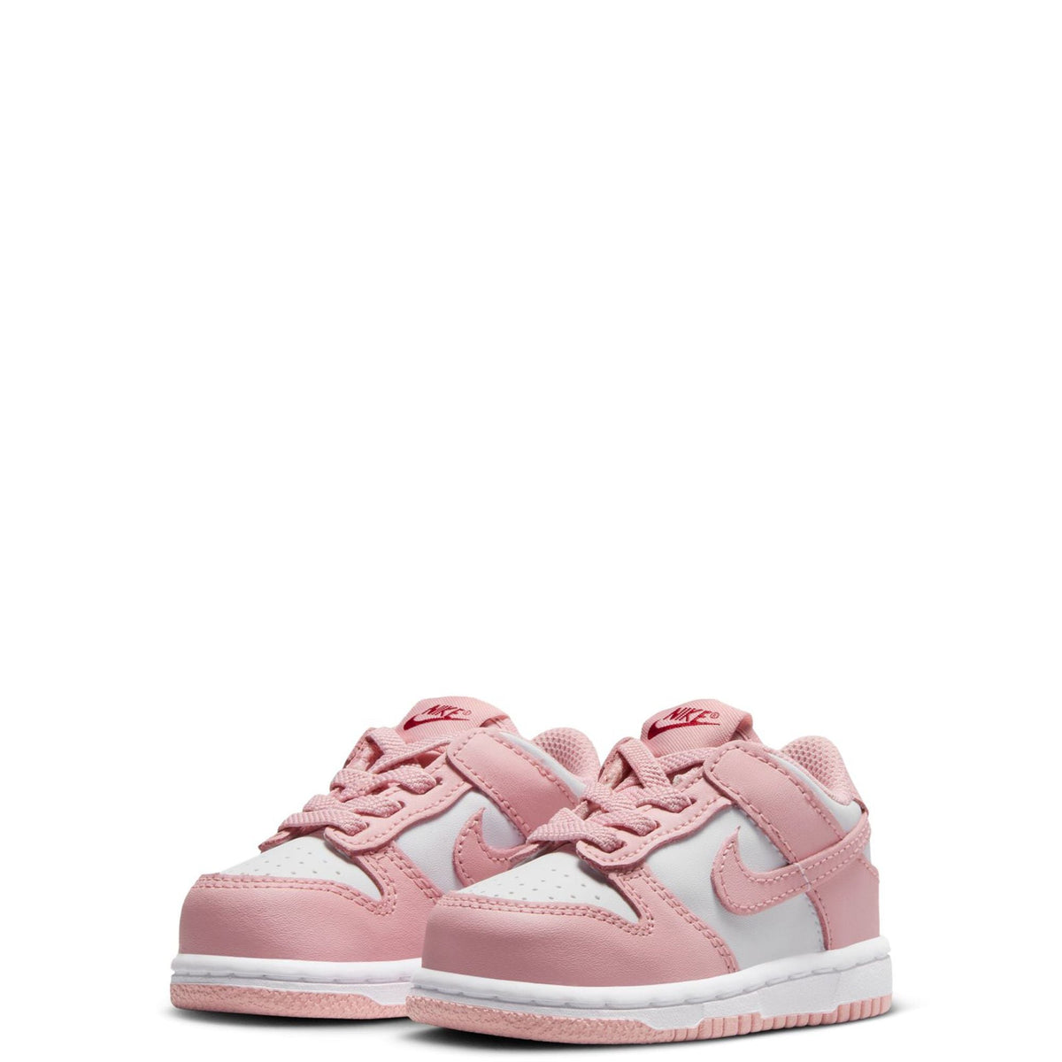 Toddler Nike Dunk Low sneakers, front view with pink laces and white toe box.