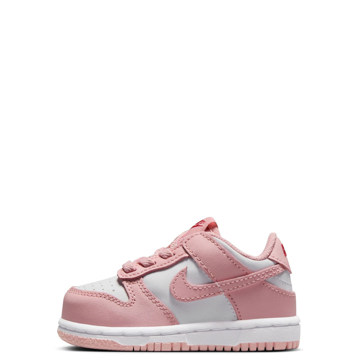Toddler Nike Dunk Low sneakers in pink and white, lace-up front with Swoosh.