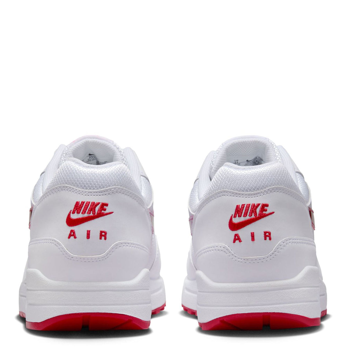 Men's Nike Air Max 1 PRM sneakers heel view, white upper with red Nike Air branding