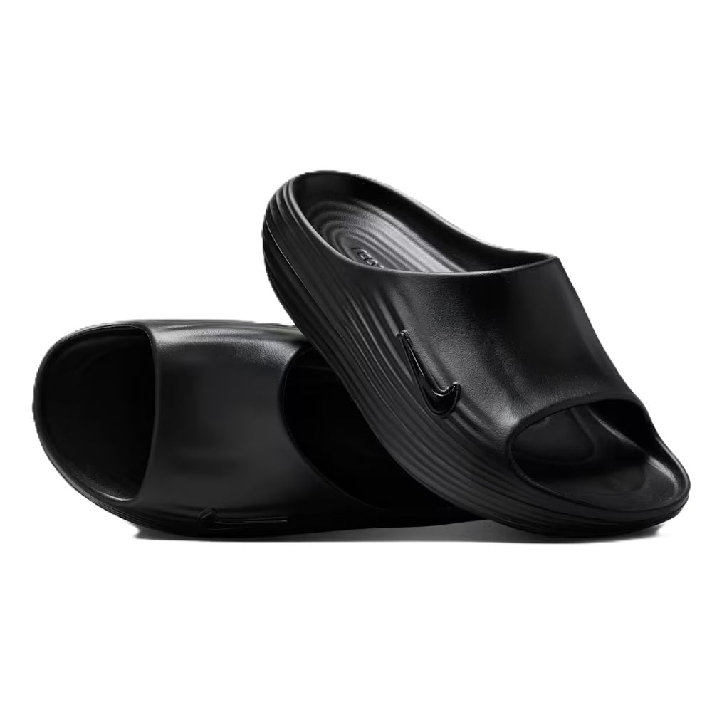 Black slide sandals with molded footbed and single-strap design