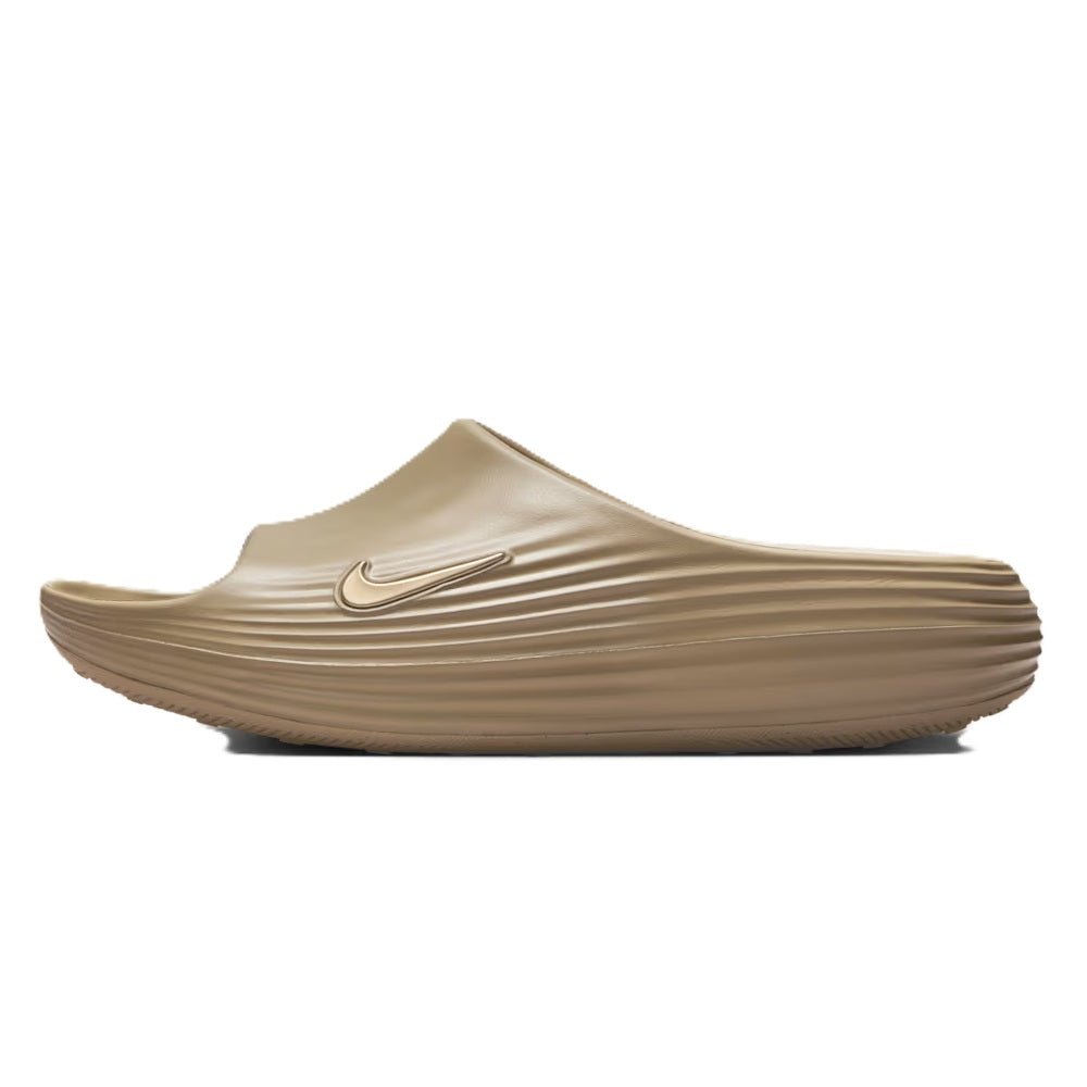 Khaki Nike slide sandal with swoosh on strap and ribbed footbed