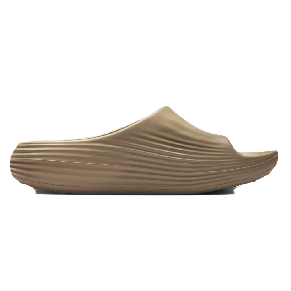 Khaki Nike slide sandal profile view with cushioned, ribbed footbed