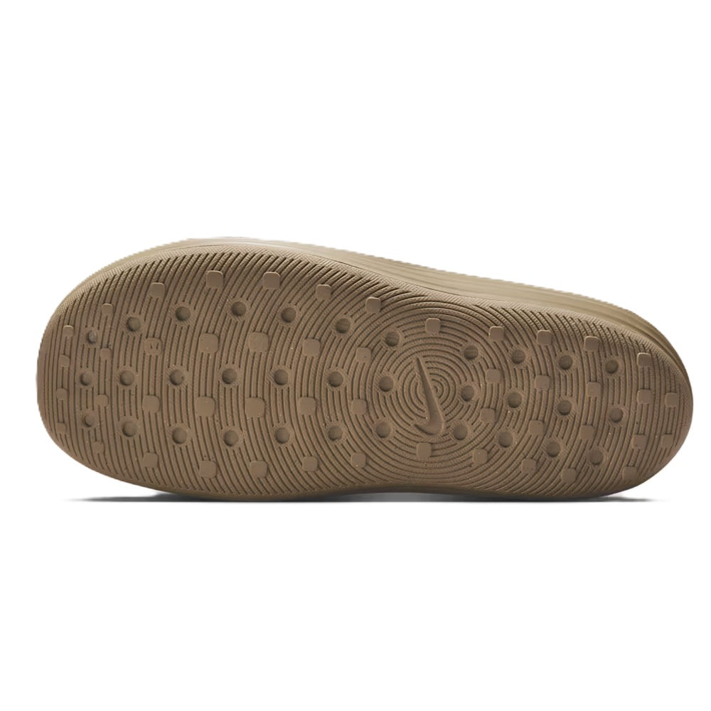 Khaki Nike slide sandal outsole with textured grip pattern and circular logo