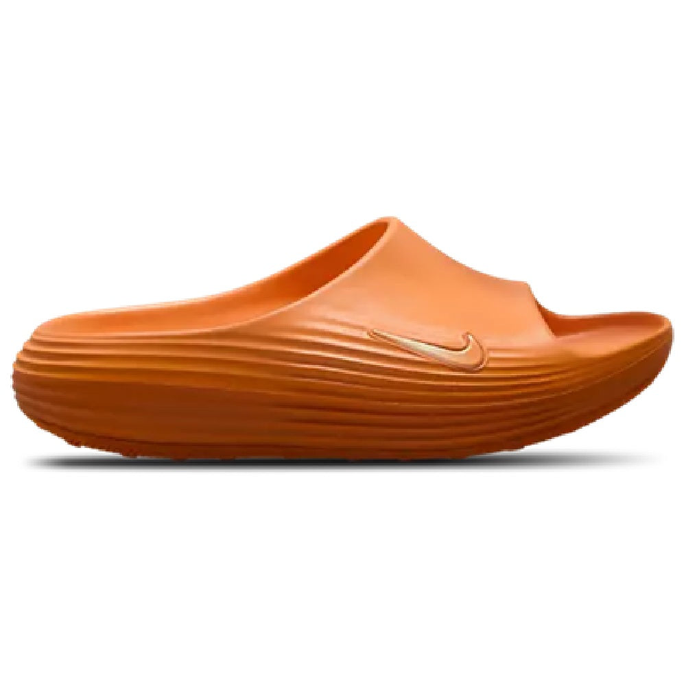 Men's Nike ReactX slide sandals in orange with Swoosh logo and cushioned footbed