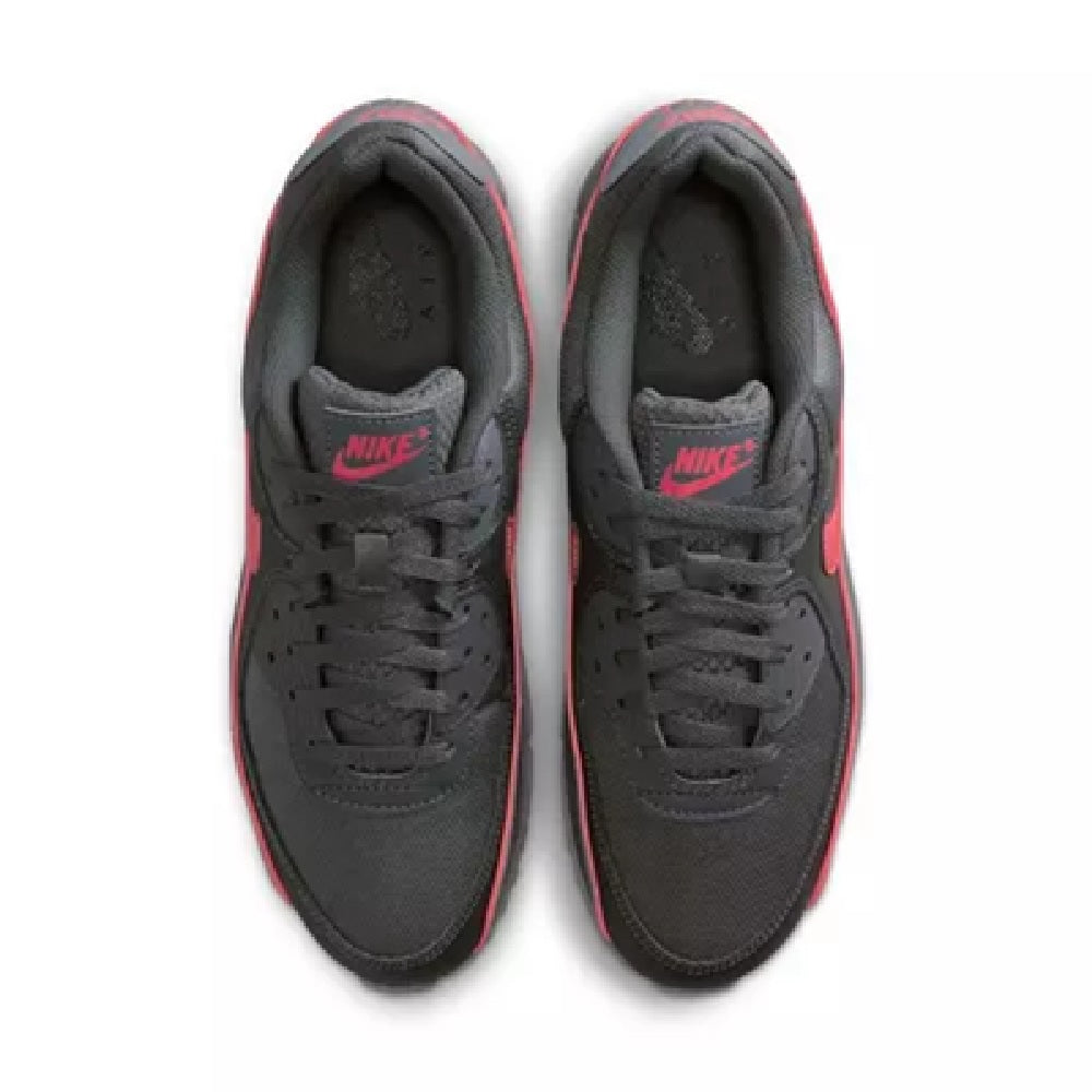 Pair of Nike Air Max 90 PRM sneakers, dark grey uppers with red accents, lace-up