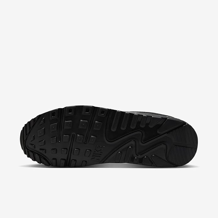 Black outsole with deep traction tread pattern and Nike swoosh detail