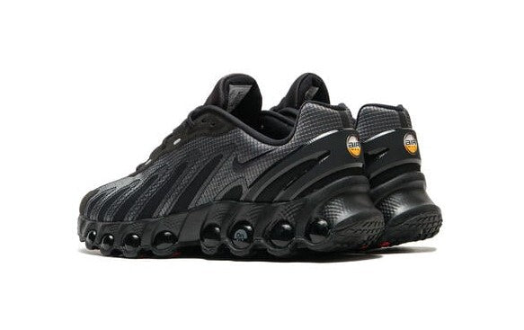 Men's Nike Air Max DN8 SE sneakers, side view black upper with gray panels