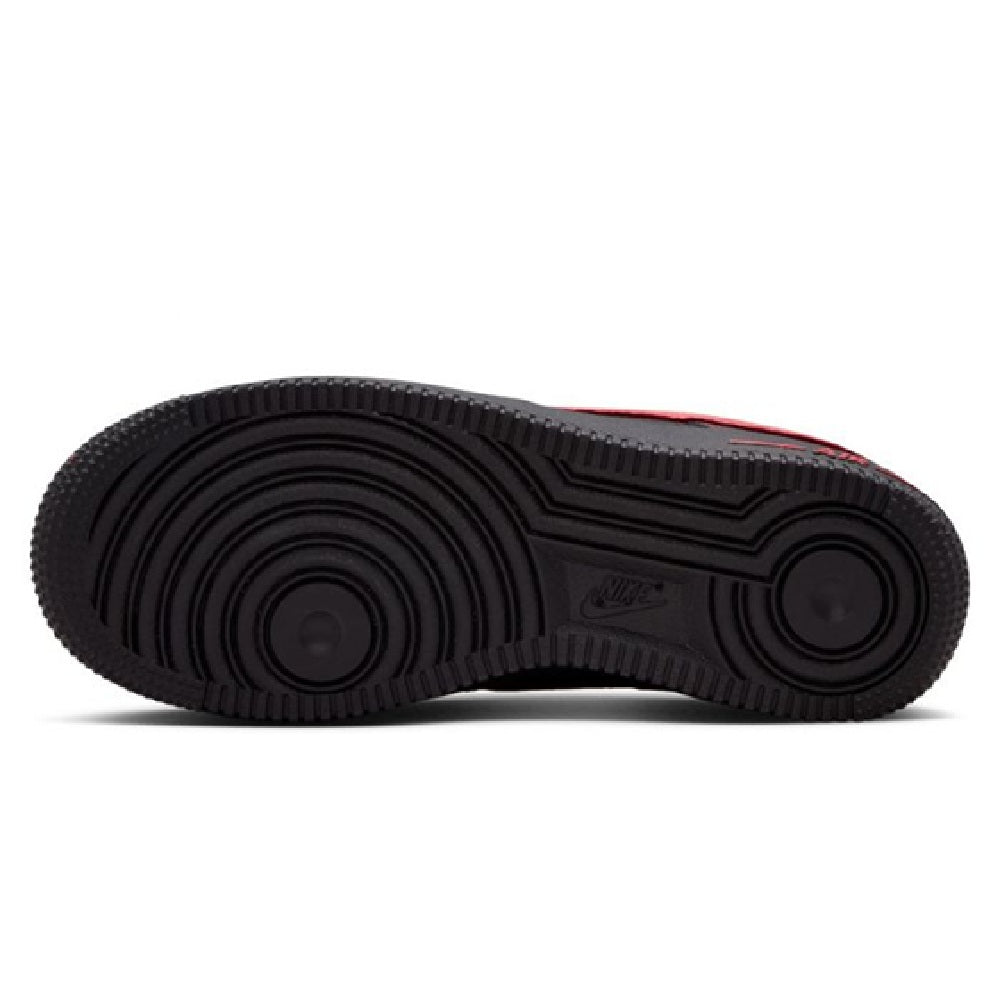 Black rubber outsole with textured tread for traction