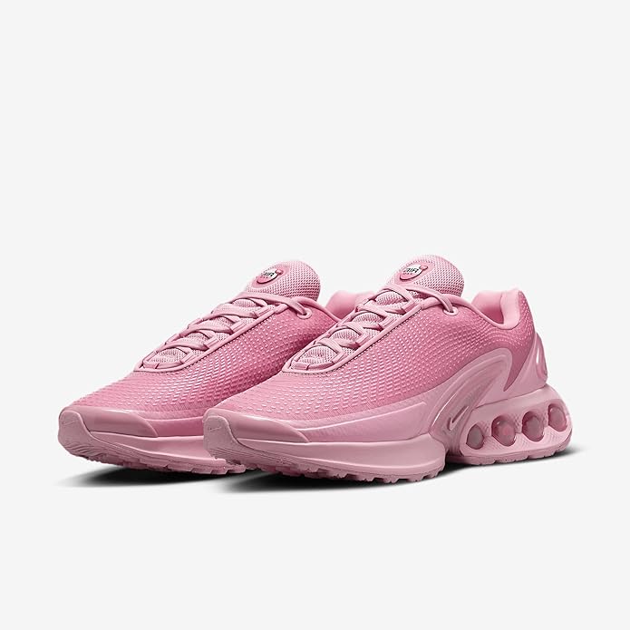 Pink Nike Air Max DN lace-up sneakers with double Swoosh side detailing