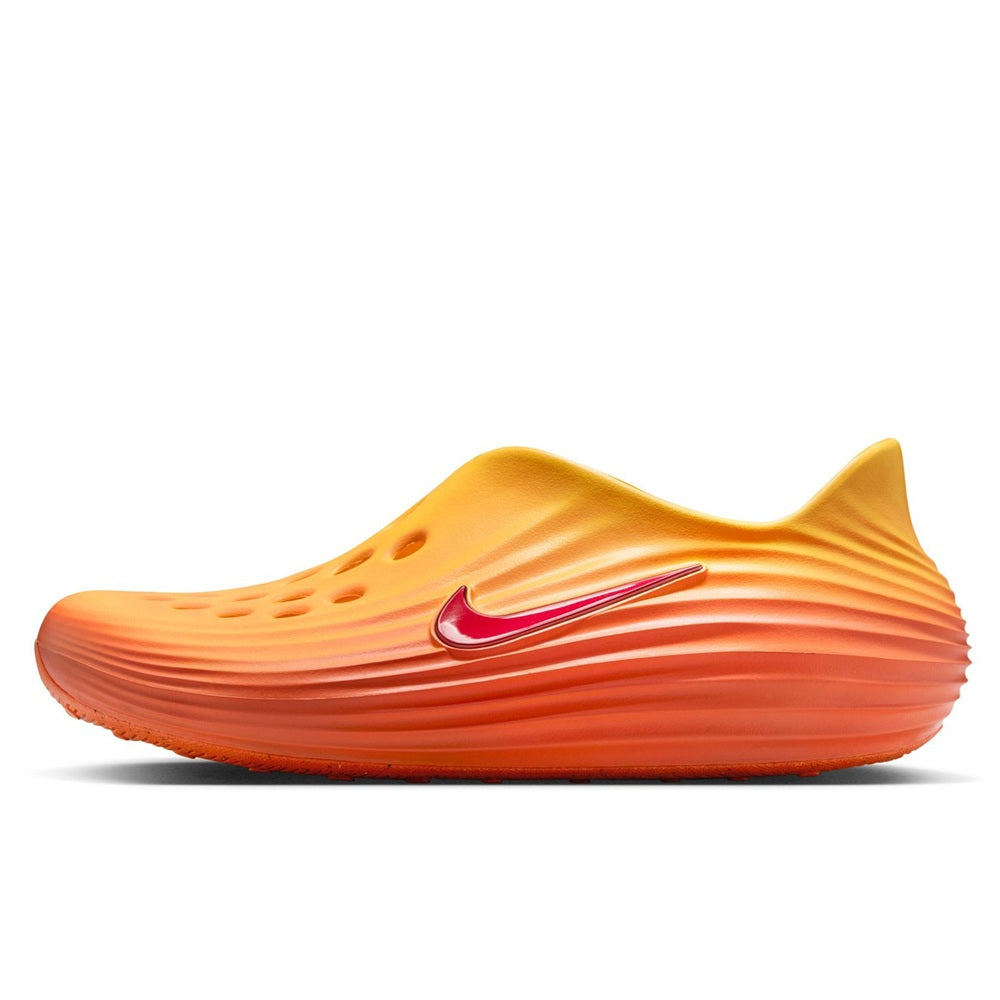 Men's Nike ReactX Rejuven8 slip-on shoe, orange-gold upper with red swoosh on side