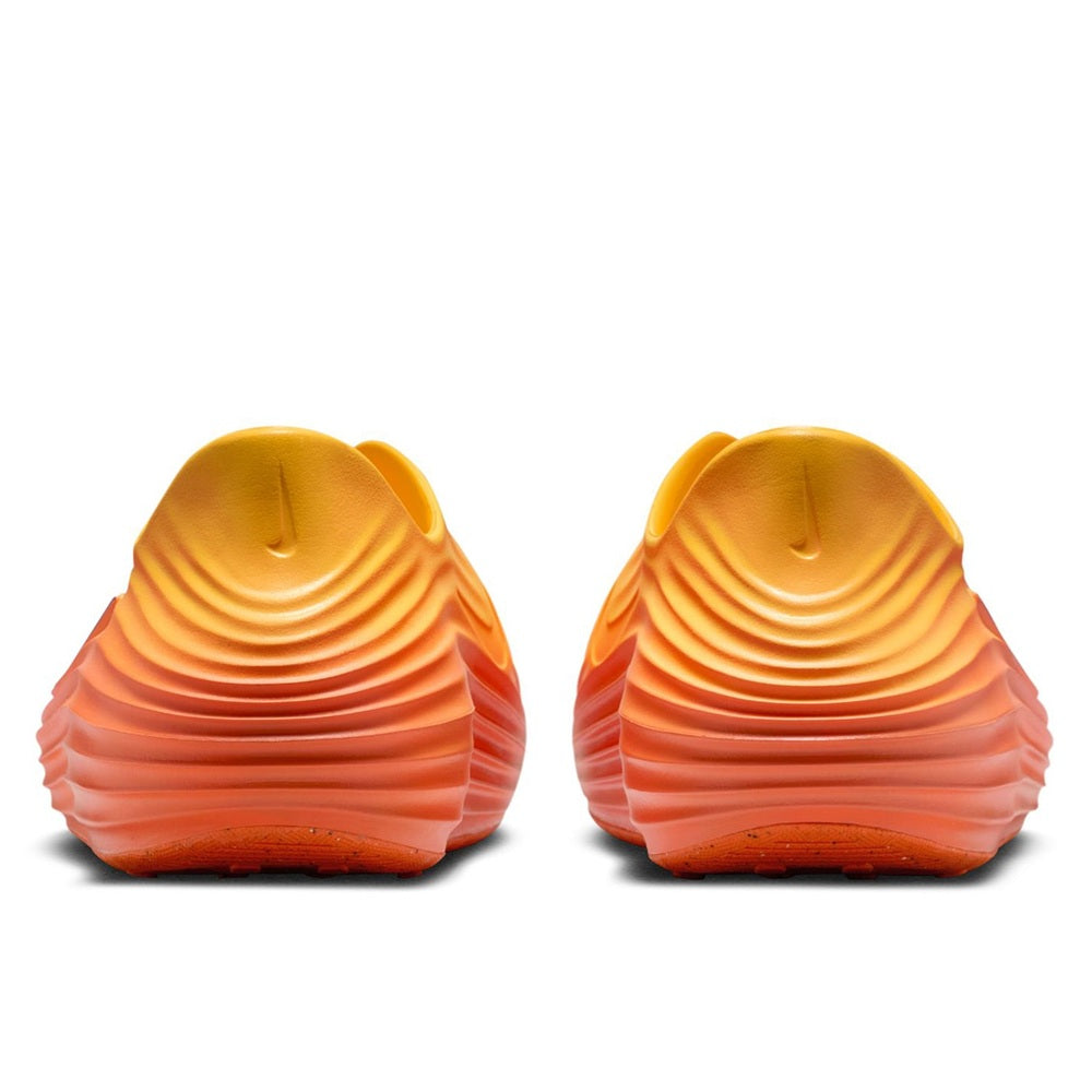 Men's Nike ReactX Rejuven8 slip-on shoe, heel view with textured ribbed design