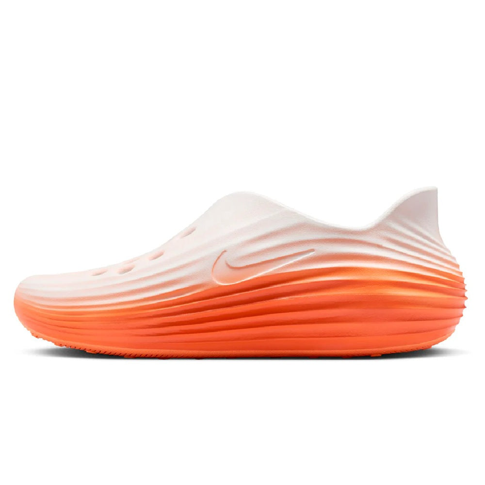 Men's Nike running slip-on shoe, white upper with orange sculpted outsole