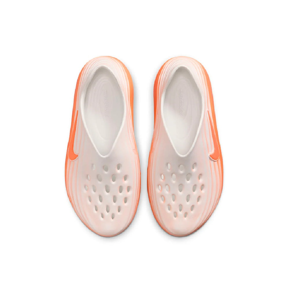 Pair of Nike slip-on shoes, white uppers with perforations and orange trim