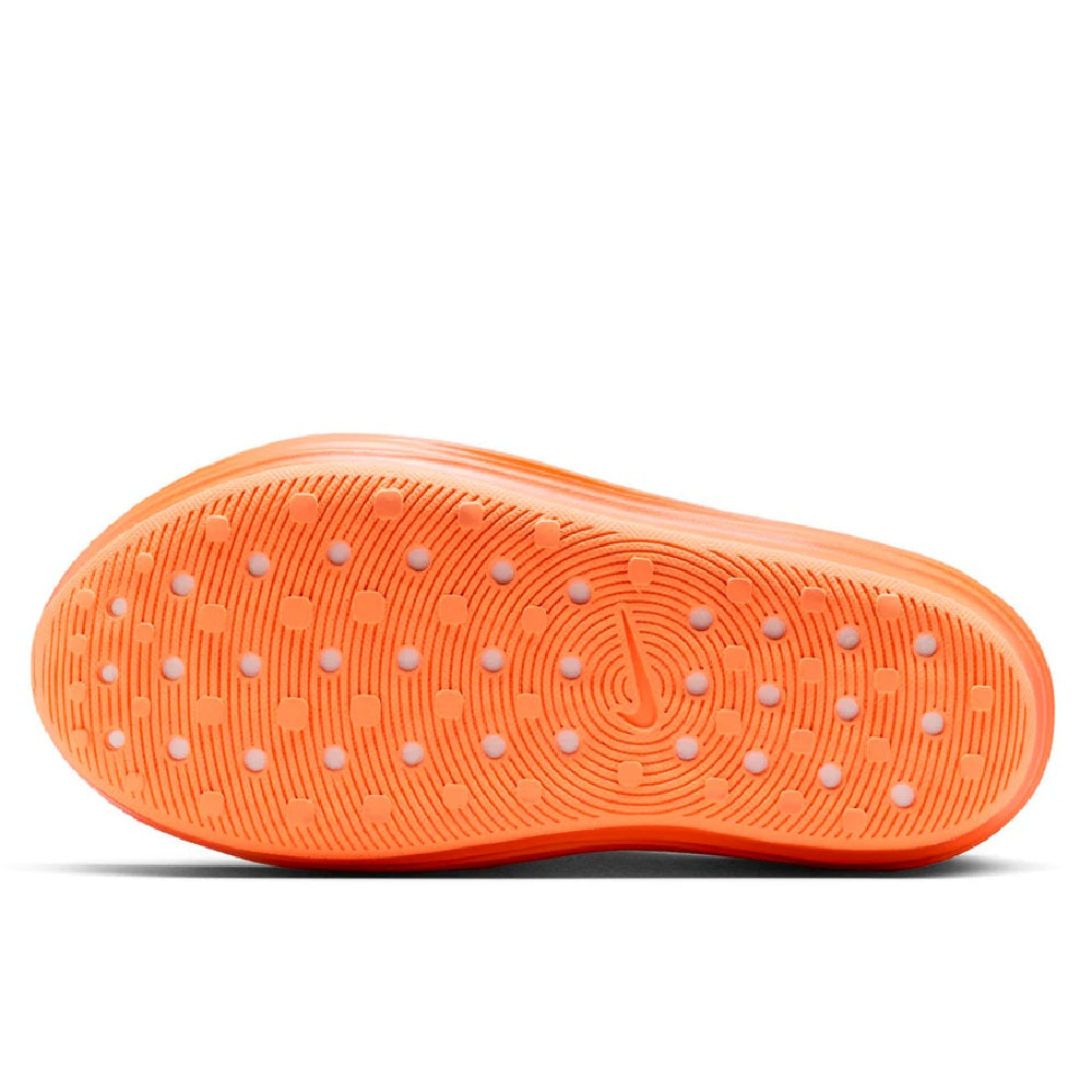 Nike shoe outsole, orange traction pattern with circular logo detail